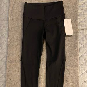 Athleta Stealth 7/8 Tight. Size XXS. BLACK sculpteck workout pants.
